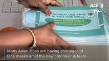 Singapore gives out masks amid virus fears and supply shortages