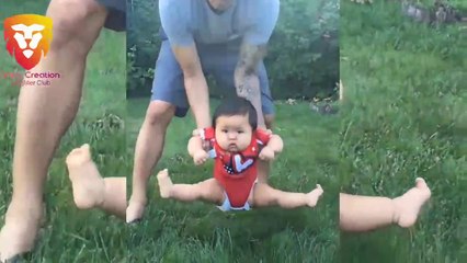 Funny babies playing a dangerous game on the grass