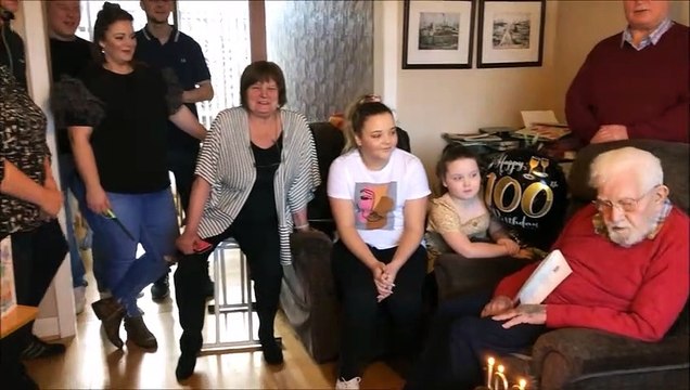 Donald Sarfar celebrating his 100th birthday with family