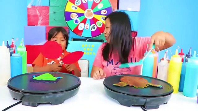 PANCAKE ART CHALLENGE Mystery Wheel!! Learn how to make Pancake Art with Ryan!!