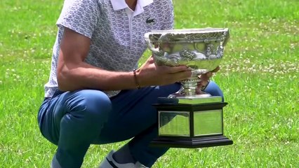 Djokovic poses with Australian Open trophy, apologises for umpire outburst