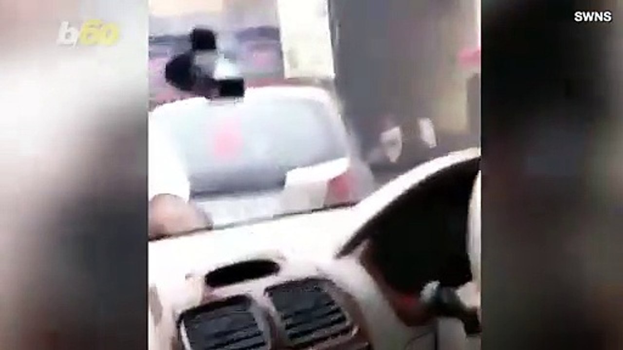 Police Officer Rides Car Hood for a Mile After Routine Traffic Stop Gone Wrong