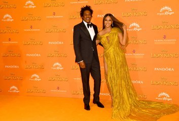 Jay-Z and Beyoncé Criticized For Sitting During the National Anthem at Super Bowl