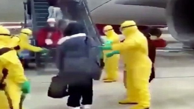 Coronavirus : Passengers sprayed with hoses on runway after flying from coronavirus epicentre