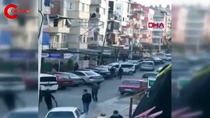 Sokak ortasında pompalı tüfekli kavga kamerada