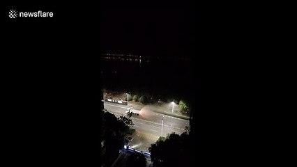 China virus: Workers in trucks are going around disinfecting an entire city near Wuhan