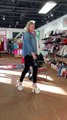 Woman Wearing Heels Loses Balance and Falls While Walking Inside Store