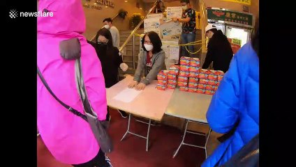 '10,000 Hong Kongers' queue to purchase face masks after waiting all night