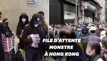 Face au Coronavirus, des milliers de Honkongais font la queue pour acheter les derniers masques