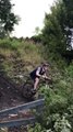 Biker Fails Jumps Down Slope and Crashes into Fence