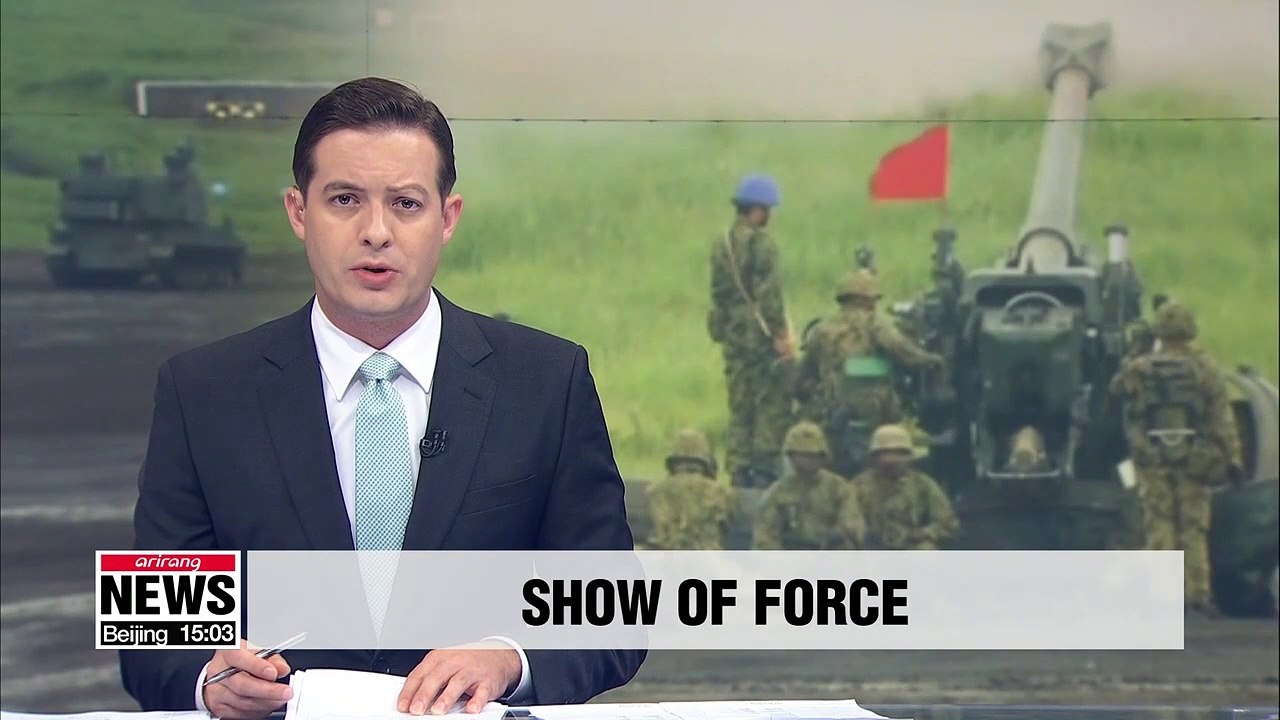 Japan's Self-Defense Forces hold massive drill focused on guarding its islands