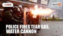 Police fire tear gas, water cannon at protesters in Hong Kong