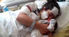 Hasta yatağında eşi tarafından bıçaklanan kadın, bebeğini kucağına aldı