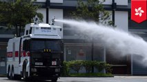 Hong Kong police use water cannons on protesters