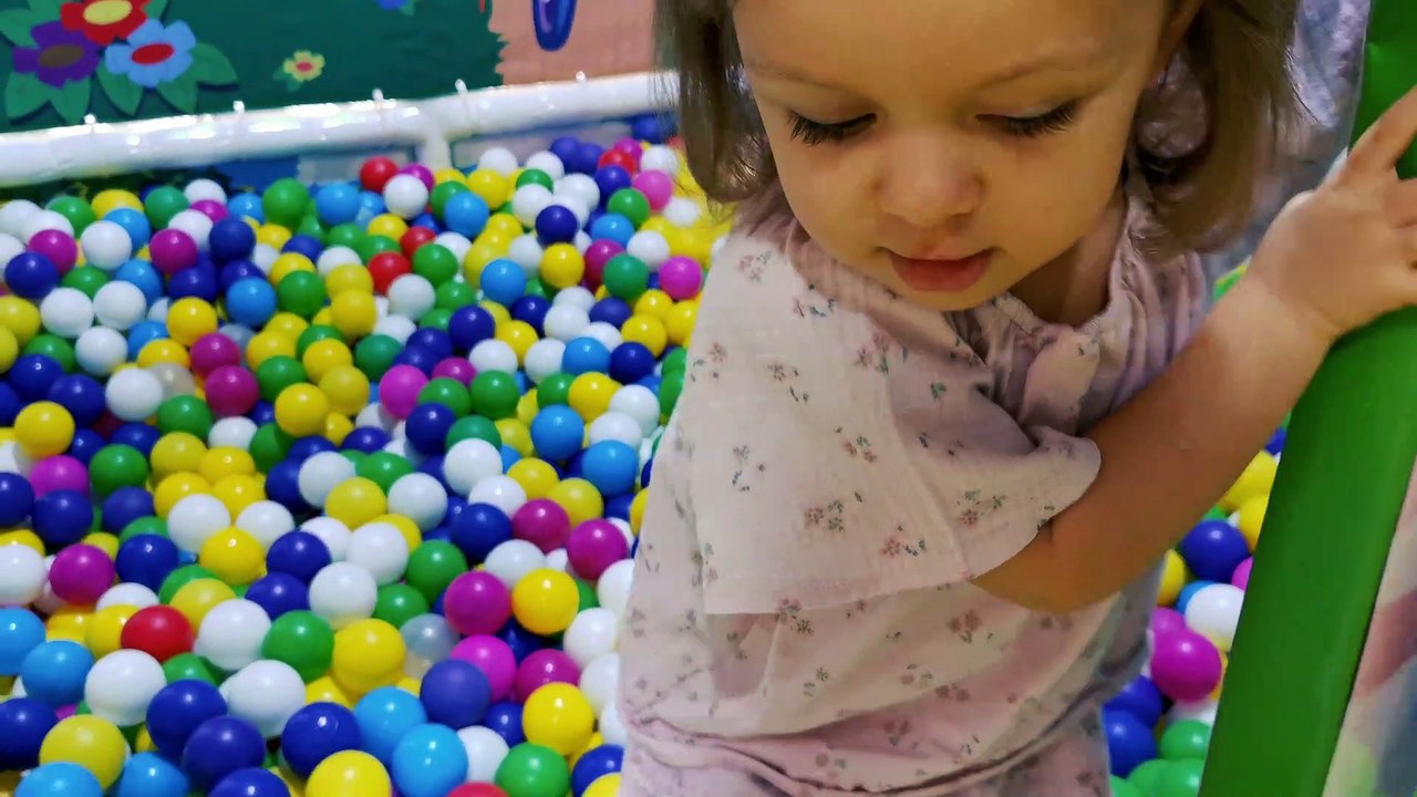 Little Mia playing in indoor playground for kids in Cheeky Monkey Dubai. Kids entertainment