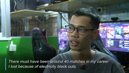 Armed with smartphones, Myanmar e-sports players battle power outages