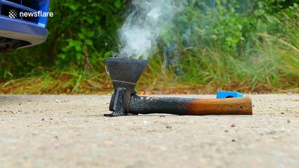 Incredible experiment as car tire takes on burning HOT axe