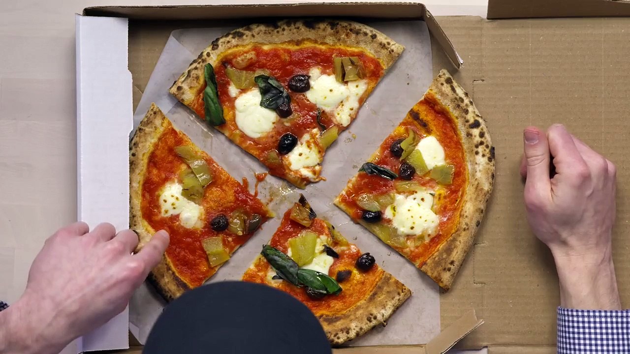 Unboxing a pizza