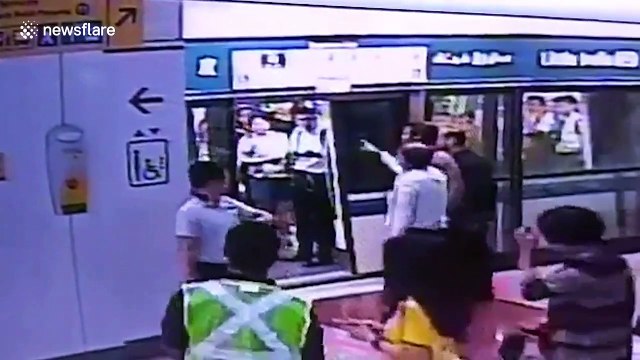 Woman in Singapore narrowly misses train then opens safety doors with her bare hands to climb inside