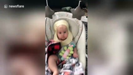 Adorable Michigan baby has burrito shell around head