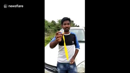 Indian man inflates 80cm balloon with his ear in bizarre feat