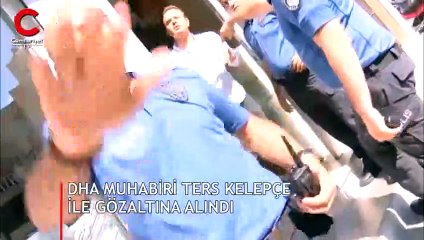 Haber takibi yapan DHA muhabirine ters kelepçe ile gözaltı