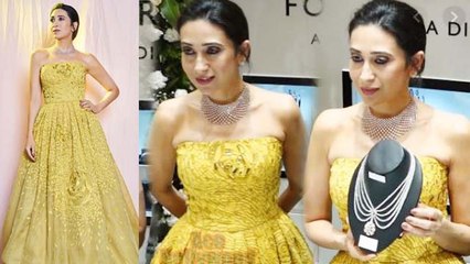 Karisma Kapoor looks classy in yellow gown during jewellery launch; Watch video | FilmiBeat