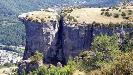 Men Traverse up Treacherous French Mountainside
