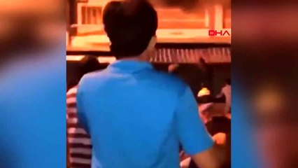 Yanan mağazada can pazarı? kurtulmak için aşağı atladılar