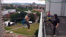Daredevil Friedi Kuehne slacklines and ropeswings between office buildings