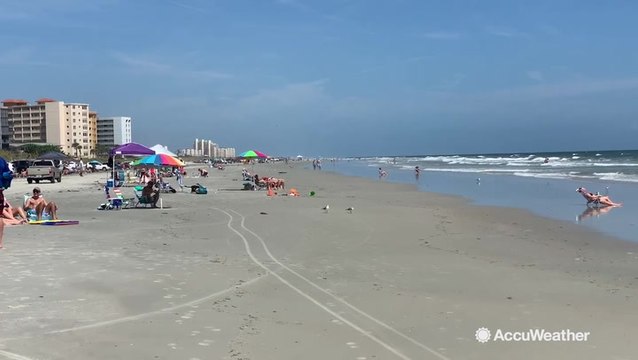 Visitors enjoy last minute stay at beach before Hurricane Dorian