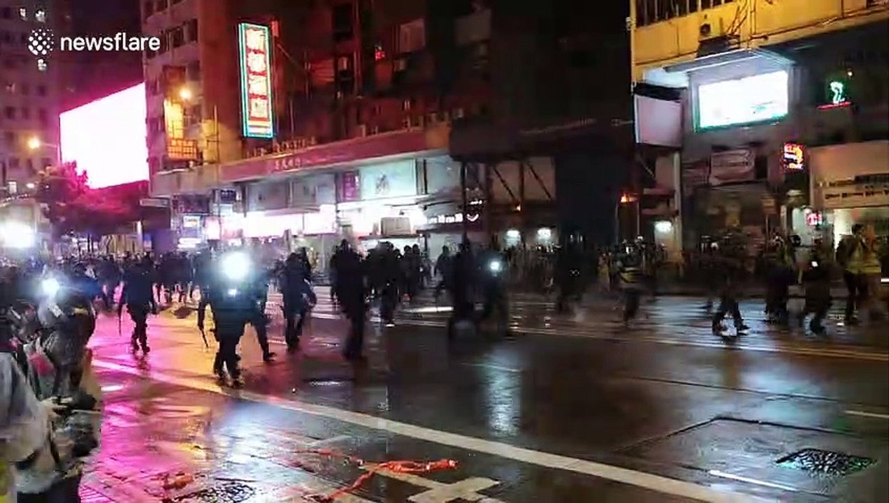 Hong Kong police use water cannon in Causeway Bay area on Saturday