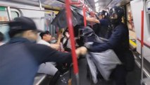 Chaos on Hong Kong’s rail network as police chase protesters into station, beat people on train, arrest over 60