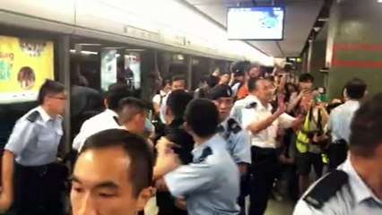 Hong Kong protesters target trains, urge general strike