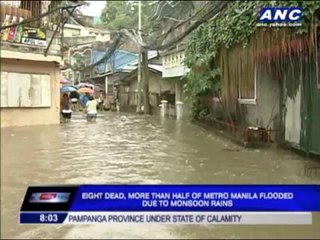8 dead as floods inundate Metro Manila