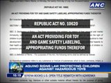 Aquino signs law protecting children against hazardous toys