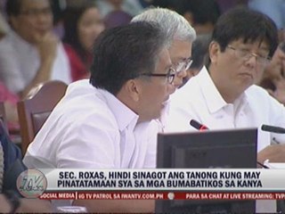 Roxas grilled in House budget hearing