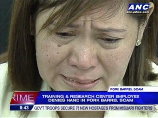 Training center worker denies hand in 'pork' scam