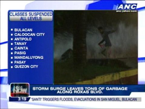 Storm surge leaves tons of trash in Roxas Blvd