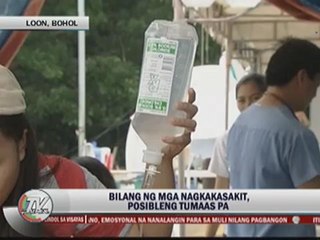 Catholic faithful hear mass amid church ruins