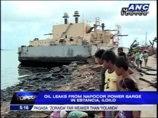 Oil leaks from barge carried by typhoon in Iloilo