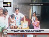 Bayan Patrollers help through 'Tulong Na' shirts