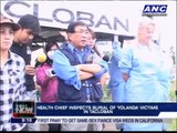 DOH chief inspects burial of 'Yolanda' victims in Tacloban