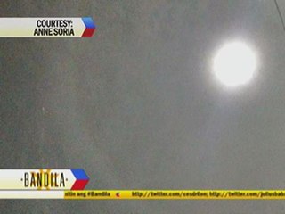 What causes a lunar halo?