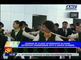 Flights attendants dance at Shanghai airport