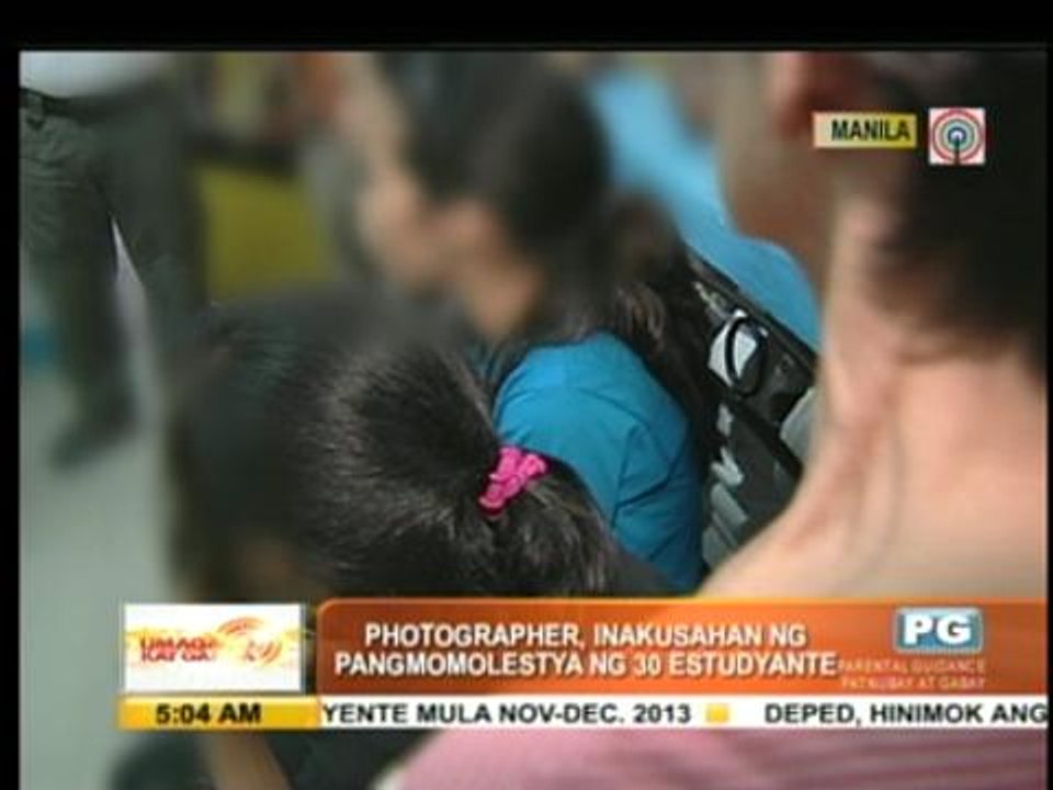 Photographer accused of molesting 30 students