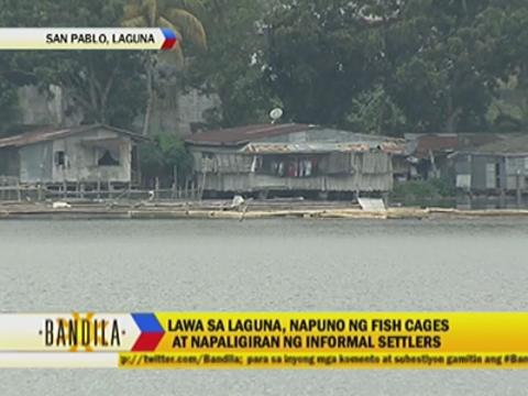 Squatters, fish cages threaten Laguna crater lake