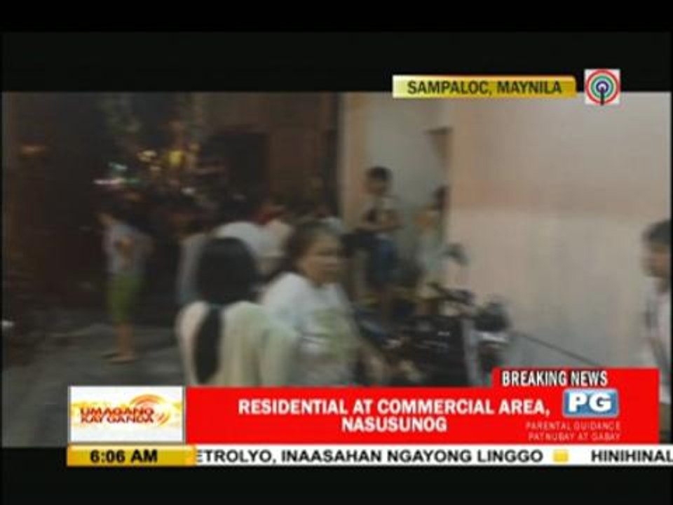 Fire razes building, homes in Manila