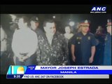 Erap dons fatigues, implements Manila truck ban