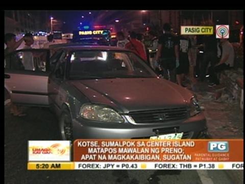 4 hurt as car slams into center island in Pasig
